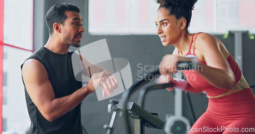 Image of Fitness couch, gym athlete and training time of a woman workout and man with a sports watch. Exercise, motivation and health cardio together for wellness and healthy living in a coaching class