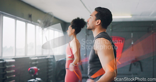 Image of Fitness, couple and skipping with rope in gym for exercise, training or cardio workout together indoors. Active man and woman in healthy jump roping for sports energy, exercising or endurance inside