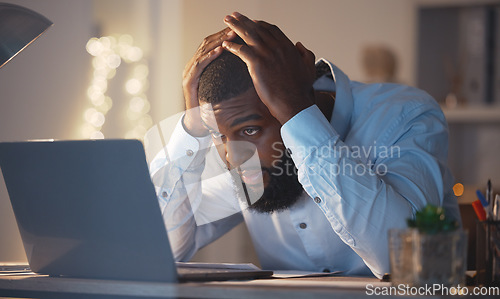 Image of Stress, worry and black man on laptop at night working late on project deadline, online glitch and problem. Burnout, business and male worker with worried, frustrated and stressed face on computer