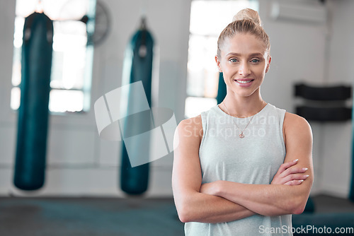 Image of Portrait, gym and smile of woman with arms crossed ready to start workout, training or exercise. Sports, fitness and happy, proud and confident female athlete from Canada preparing for exercising.