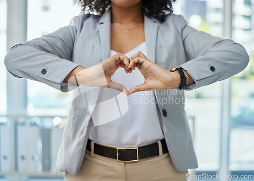 Image of Business woman, fingers and heart hands for corporate customer care, client support or leadership trust. Worker, employee or hand gesture for love, sign or emoji symbol for wellness, vote or CRM hope