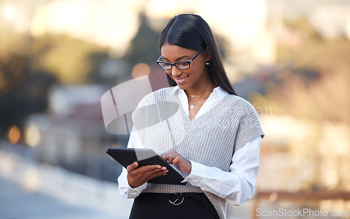 Image of Woman, tablet and typing in street with smile for texting, social media or chat app at job for digital newspaper. Journalist, content creator and mobile touchscreen for notes, news and idea for story