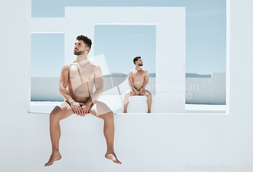 Image of Art, pose and naked men sitting in creative architecture, sun and blue sky, muscle and athletic lgbt body. Pride, gay models posing as nude Greek athlete in and freedom in artistic self expression.