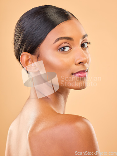 Image of Beauty, portrait and face of woman in studio for skincare, cosmetics, dermatology or makeup. Aesthetic female skin for self care, natural glow and spa facial shine results on a brown background