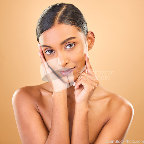 Image of Skincare, face portrait and beauty of woman in studio isolated on a brown background. Makeup, cosmetics and happy Indian female model with spa facial treatment for healthy, glow or flawless skin.