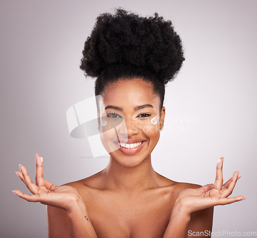 Image of Black woman, moisturizer cream and smile for skincare beauty or cosmetics against a gray studio background. Portrait of happy African female smiling with moisturizing creme, lotion or facial product