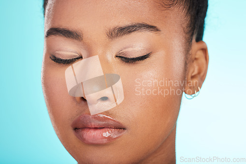 Image of Skincare, woman makeup and face closeup of beauty, dermatology and facial treatment. Spa, wellness and skin glow aesthetic with a studio background with young female, cosmetics and self care