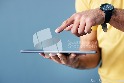 Image of Man, hands and tablet pointing on mockup for interactive design, touch or networking against a studio background. Hand of male with finger point gesture on mobile responsive touchscreen on copy space