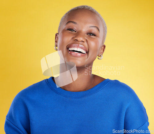 Image of Black woman, smile and face portrait in studio for motivation, beauty and happiness and mindset. Young african aesthetic female model on a yellow background laughing for cosmetics and positive color