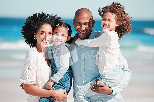 Image of Family, smile and portrait at beach on vacation, bonding and care at seashore outdoors. Holiday relax, summer ocean and happy father, mother and kids, girls or children enjoying quality time together