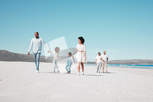 Image of Mother, father and children walking on beach with grandparents on summer holiday, vacation and weekend. Happy family, travel and mom, dad and kids holding hands for fun, bonding and quality time