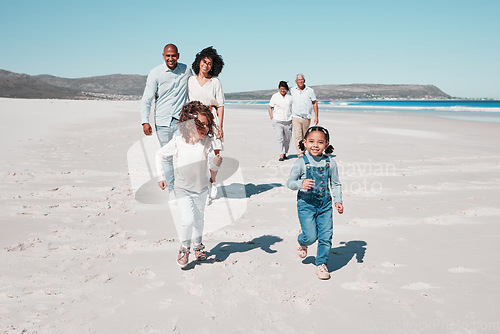 Image of Mother, father and children play on beach to relax on summer holiday, vacation and weekend. Happy family, grandparents and mom, dad and girls running for freedom, adventure and quality time by ocean