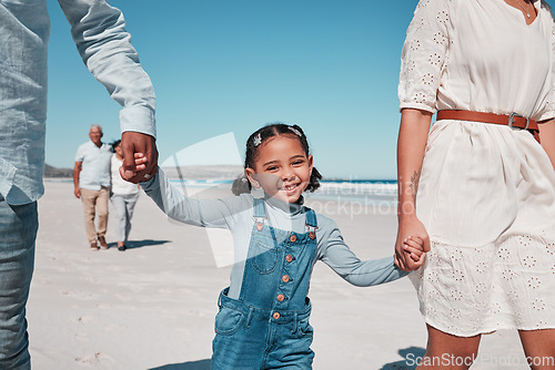 Image of Mother, father and girl holding hands by the beach to relax on summer holiday, vacation and weekend. Happy family, travel and portrait of child with mom and dad for fun, bonding and quality time