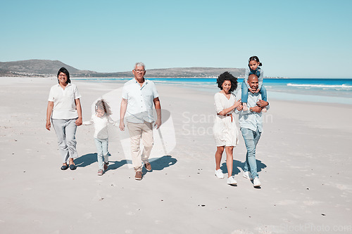 Image of Beach, grandparents and children walking with parents to relax on summer holiday, vacation and weekend. Happy family, travel and mother, dad and kids holding hands for fun, bonding and quality time