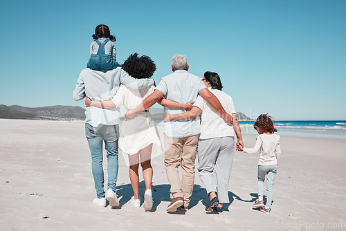 Image of Back of family on beach walking with children to relax on summer holiday, vacation and weekend together. Travel mockup, ocean and grandparents, parents and kids hug for bonding, quality time and calm