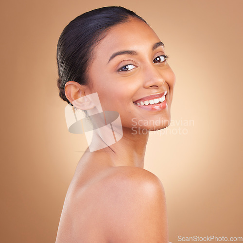 Image of Skincare, beauty and portrait of Indian woman with smile for wellness, healthy skin or facial treatment in studio. Dermatology, luxury spa and face of happy girl with makeup, cosmetics and confidence