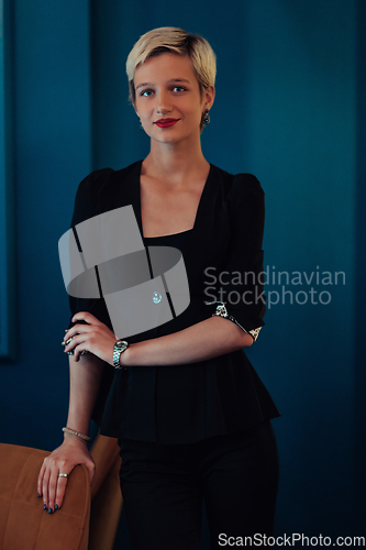 Image of Blonde business woman, successful confidence on modern blue mat background. Selective focus