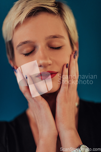 Image of Photo Beautiful businesswoman, successful confident young woman posing with hands on face. Selective focus