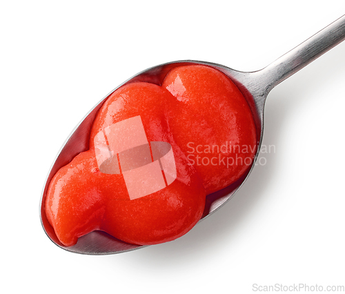 Image of tomato puree in a spoon