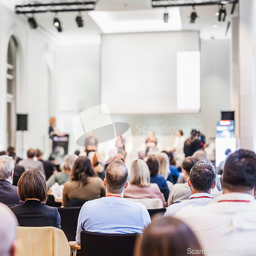 Image of Round table discussion at business conference meeting event.. Audience at the conference hall. Business and entrepreneurship symposium.