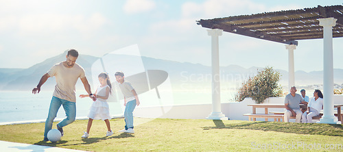 Image of Family, father and playing football at beach on vacation, having fun and bonding. Soccer, sports and happy dad play with kids or children for exercise, care and enjoying holiday at seashore in summer