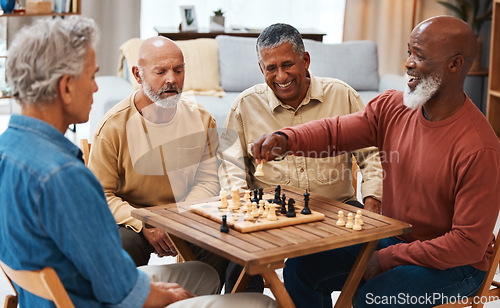 Image of Chess, friends and board games on wooden table for strategic, cocky or tactical move at home. Senior group of men playing and holding white knight piece after attack showing skill and tactics