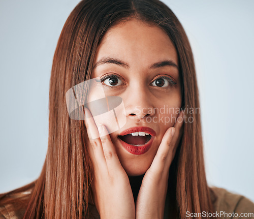 Image of Shock, expression and portrait of a woman with a reaction isolated on a white background in a studio. Wow, unexpected and face of a girl expressing surprise, amazement and fear emotion on a backdrop