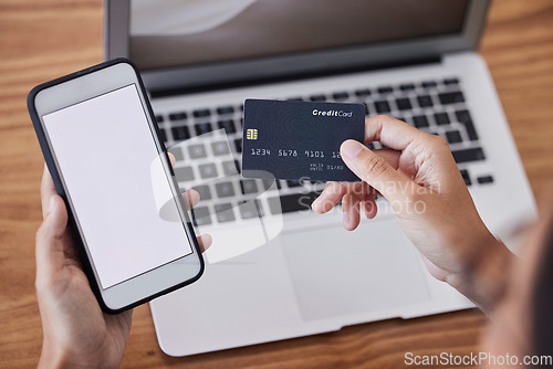 Image of Hands, credit card and phone mockup for ecommerce, purchase or electronic transaction at office desk. Hand of shopper holding mobile smartphone display for internet banking, app or online shopping