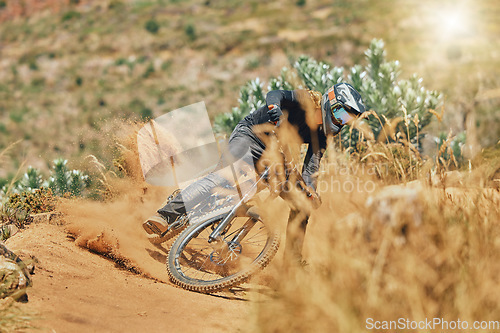 Image of Extreme sports, man and cycling on bicycle in the countryside for fitness, stunt and freedom. Nature, biking and sporty male cyclist training, practice and speed, action and free on Mexico dirt road