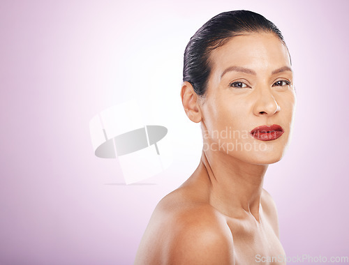 Image of Face, makeup and red lipstick of woman in studio isolated on a purple background mockup. Skincare, cosmetics and portrait, serious and mature female model with lip gloss for skin aesthetic and beauty