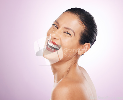 Image of Laughing, face makeup and lipstick of woman in studio isolated on a purple background. Skincare, cosmetics portrait and happy, funny and mature female model with red lip gloss for skin glow or beauty