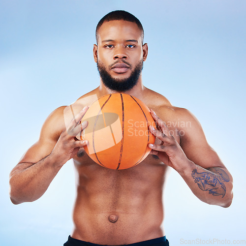 Image of Basketball, sports and portrait of black man in studio serious face for fitness, exercise and training. Sport mockup, motivation and male athlete focus with ball for playing, workout and practice