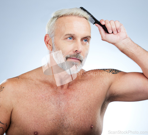 Image of Haircare, combing and grooming with man in studio for style, barber and morning routine. Beauty, hairdresser and salon with senior male on white background for handsome, self care and brushing