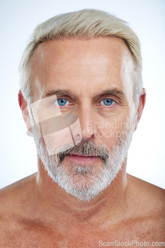 Image of Old man, portrait and serious, face with beauty and grooming, hygiene with skincare on studio background. Dermatology, headshot and skin with anti aging cosmetic care, senior male and wellness