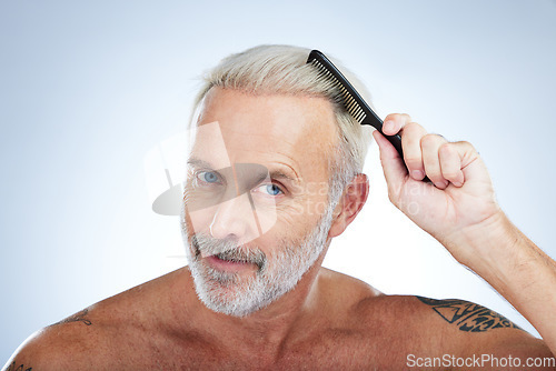 Image of Hair style, comb and portrait of man in studio for haircare, barber and morning routine. Beauty, hairdresser and salon with senior male on white background for handsome, self care and brushing