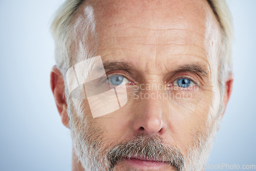 Image of Old man, portrait and serious, face with beauty and grooming, hygiene with skincare on studio background. Closeup, dermatology and clean with anti aging cosmetic care, senior male and wellness