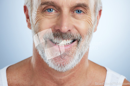 Image of Senior man, face and teeth with smile for dental care, hygiene or surgery against a studio background. Portrait of happy elderly male smiling for facial, tooth whitening or oral and mouth treatment