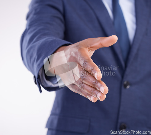 Image of Open hand shake, studio closeup and man with welcome, hiring opportunity and partnership by white background. Recruitment expert, businessman or hr manager with shaking hands in agreement by backdrop