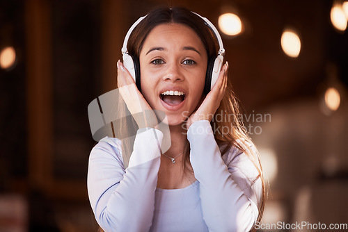 Image of Woman, portrait or surprise music headphones in cafeteria, restaurant or coffee shop in studying break, rest or relax singing. Face, shocked or student listening to audio, radio or university podcast