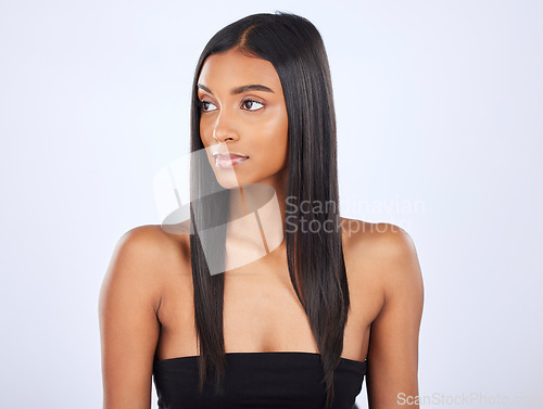 Image of Mockup, hair care or Indian woman in studio for healthy natural shine, keratin growth or wellness. Beautiful glowing young girl model, self love or salon cosmetics in grooming on white background