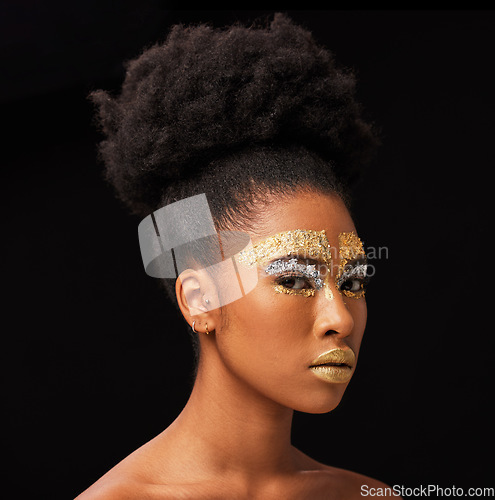 Image of Beauty, gold and glamour with black woman and makeup in studio for luxury, cosmetics and African pride. Natural, creative and goddess with female model on background for queen, bronze and glitter