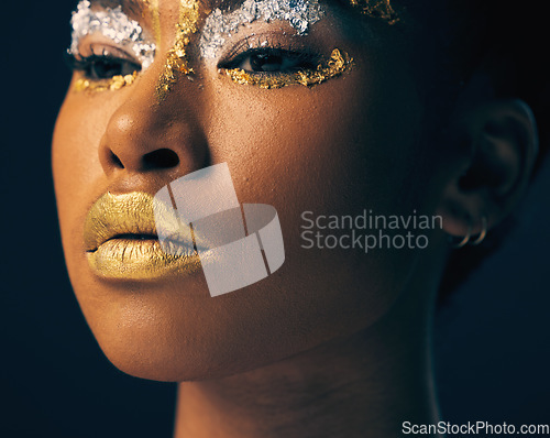 Image of Beauty, gold and face with black woman and makeup in studio for luxury, cosmetics and African pride. Natural, creative and goddess with female model on background for queen, bronze and glamour