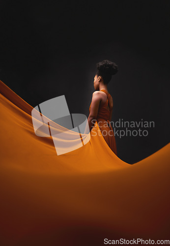 Image of Black woman, art and fashion, fabric with mockup on dark background with beauty and aesthetic movement. Flowing silk, fantasy and artistic African model in creative designer dress in studio from back