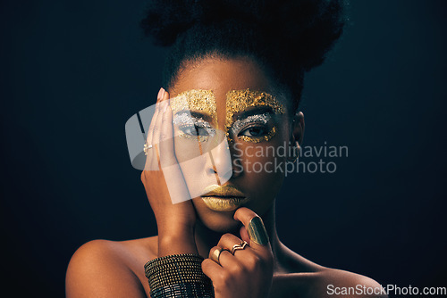 Image of Makeup, gold and fantasy with portrait of black woman in studio for luxury, cosmetics or African pride. Natural, creative and goddess with female model on background for queen, bronze or glamour art