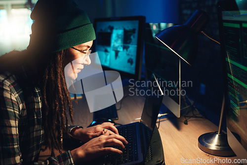 Image of Woman, laptop and hacker typing in home with software, data programming or cybersecurity. Developer, it coder and female focus on hacking, phishing or malware code on computer for dark web at night.