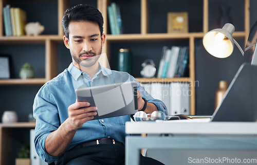 Image of Business man, tablet and internet in office for productivity, planning and startup research. Male employee working on digital technology, website strategy and scroll trading app for data management