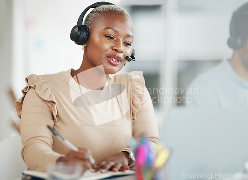 Image of Call center and writing black woman consultant in office talking, technical support or advisory service planning. Contact agent or virtual person speaking in telemarketing, telecom or online business