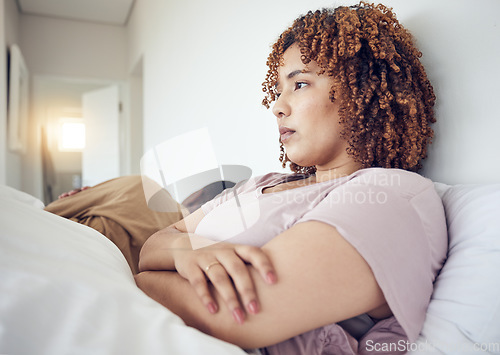 Image of Couple fight, angry woman and bedroom with a mad mixed race female and man feeling frustrated in bed. Home, conflict and relationship problem of a marriage fail and divorce issue in the morning