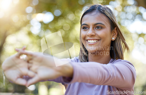 Image of Sports, nature and woman doing a stretching workout before a workout in the park or garden. Fitness, wellness and female athlete doing arm warm up exercise before pilates training outdoor in field.