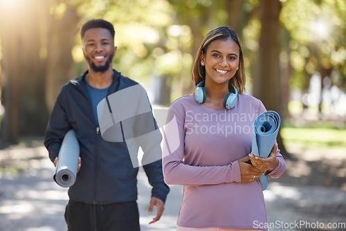 Image of Fitness, couple and portrait smile for yoga, spiritual wellness or healthy exercise together in nature. Happy woman and man yogi smiling with mat for calm zen training, practice or workout at a park